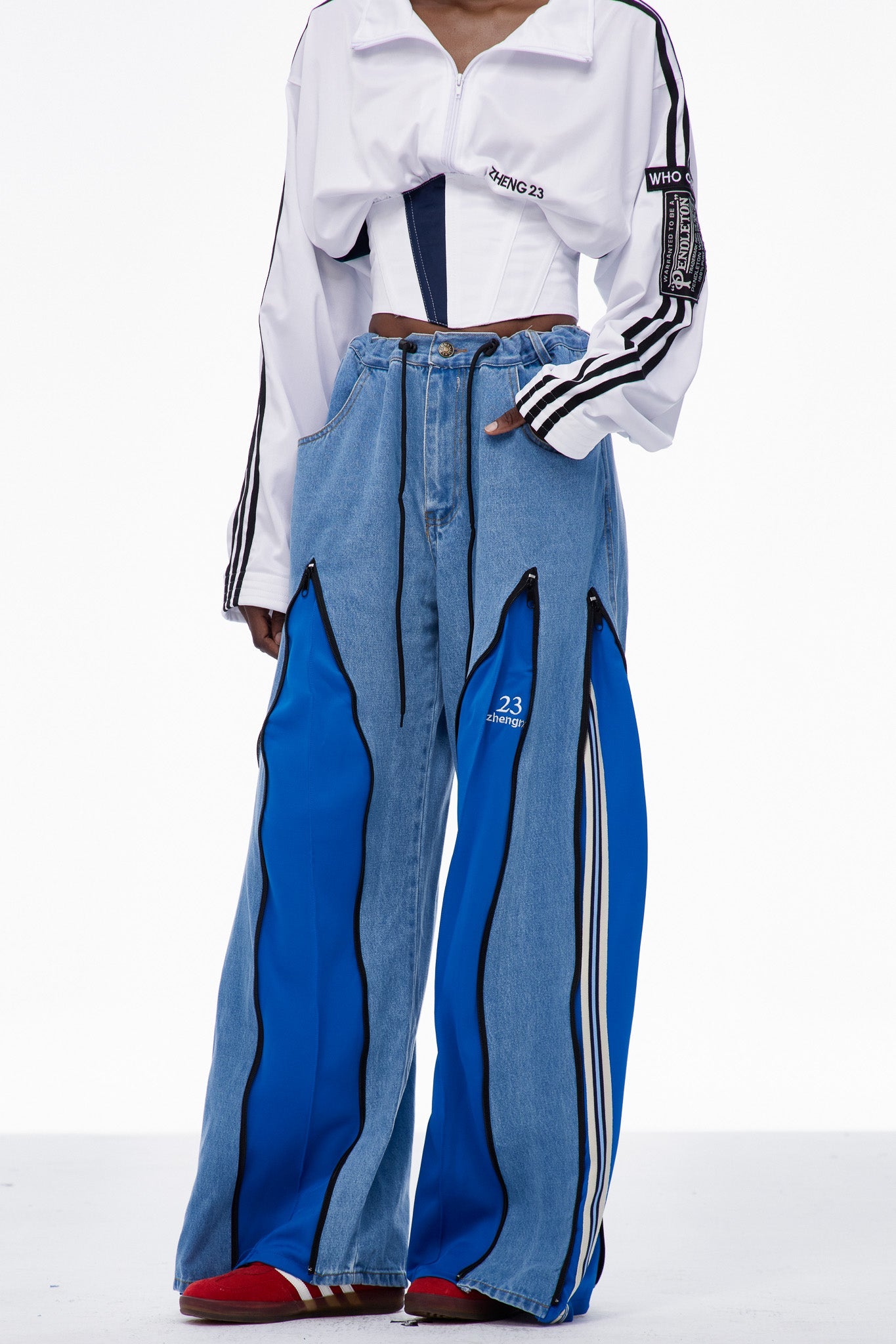 Caprina Deconstruct Zipper Stripe Jeans In Blue