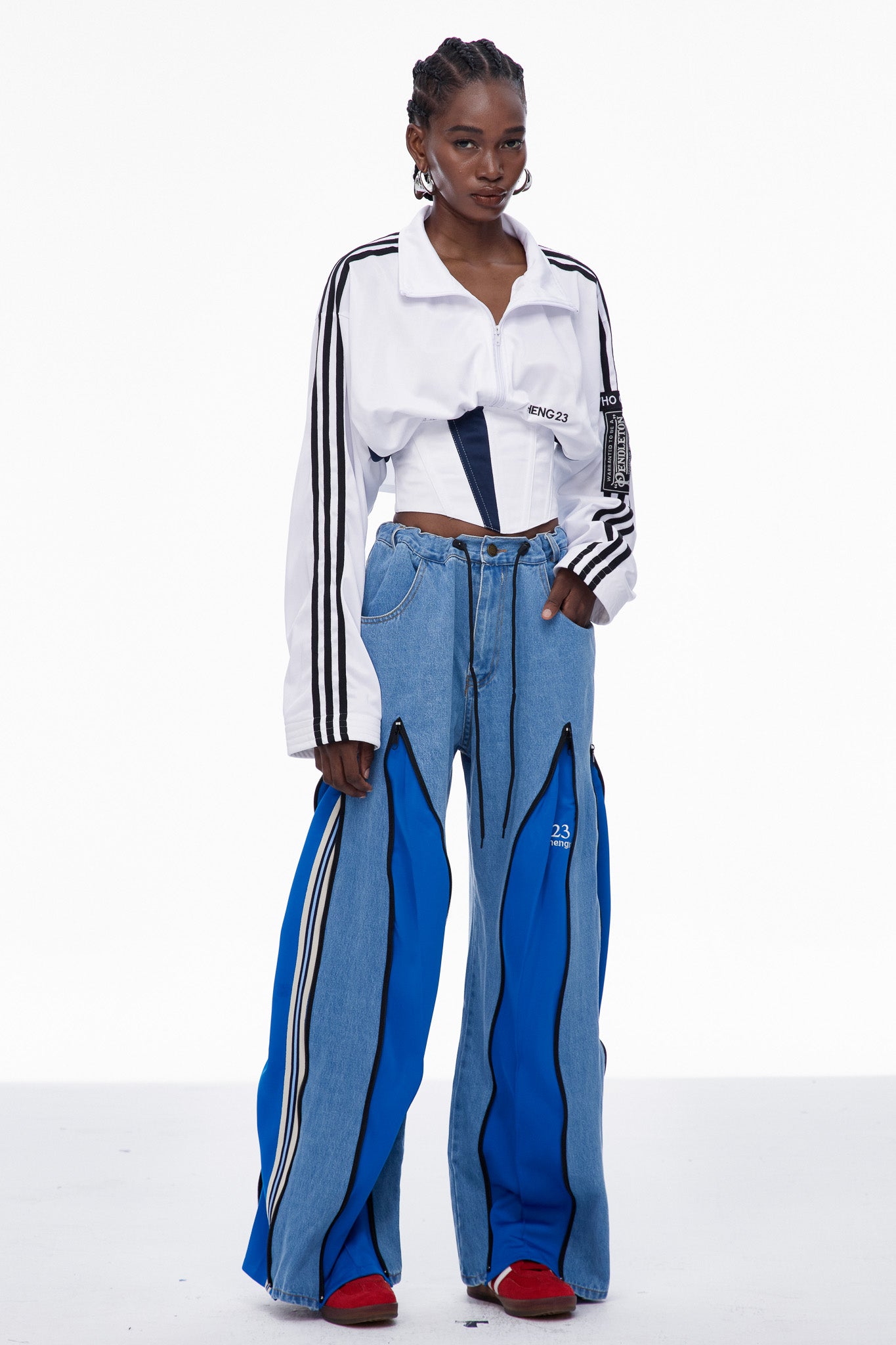 Caprina Deconstruct Zipper Stripe Jeans In Blue