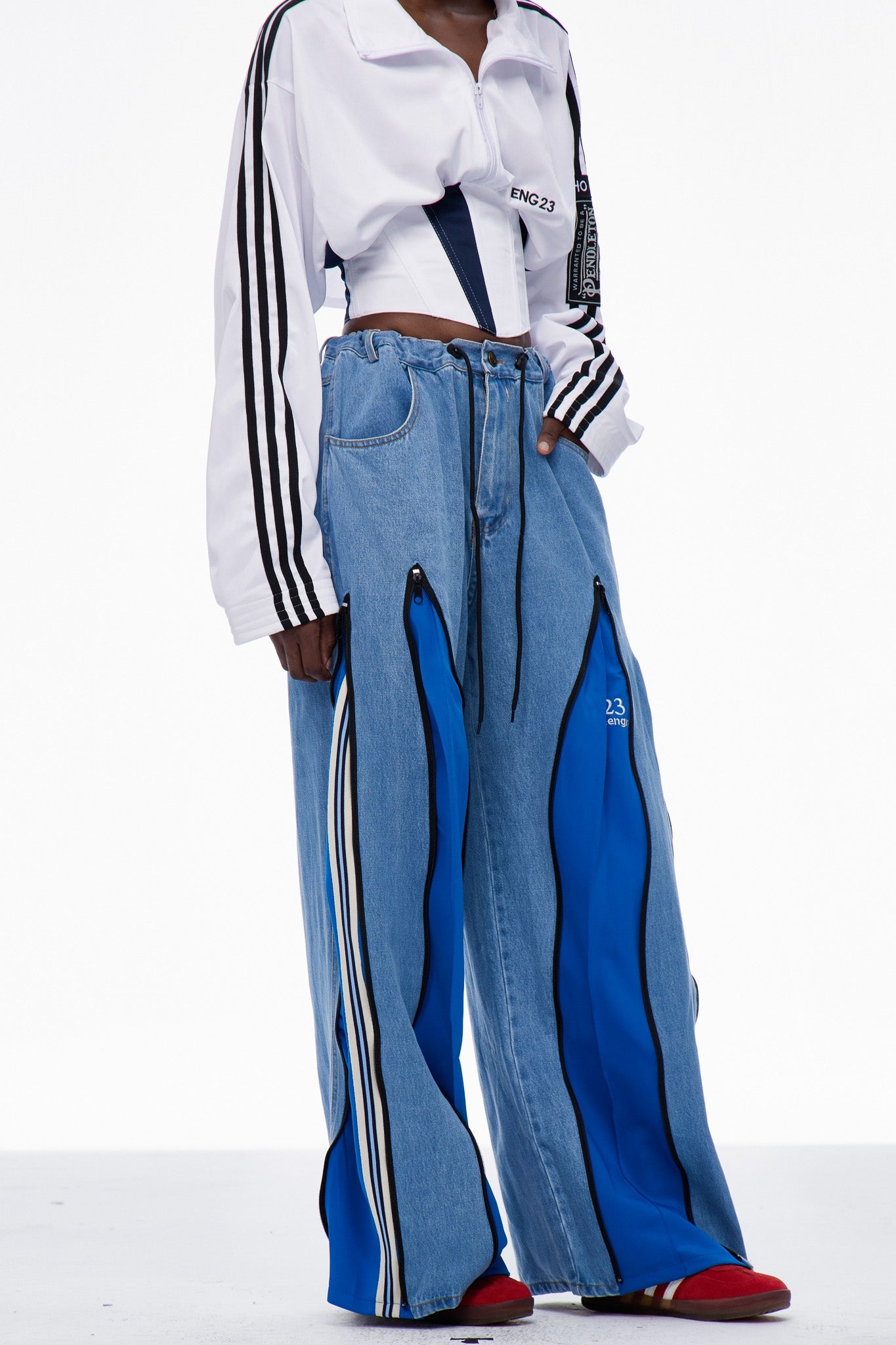 Caprina Deconstruct Zipper Stripe Jeans In Blue