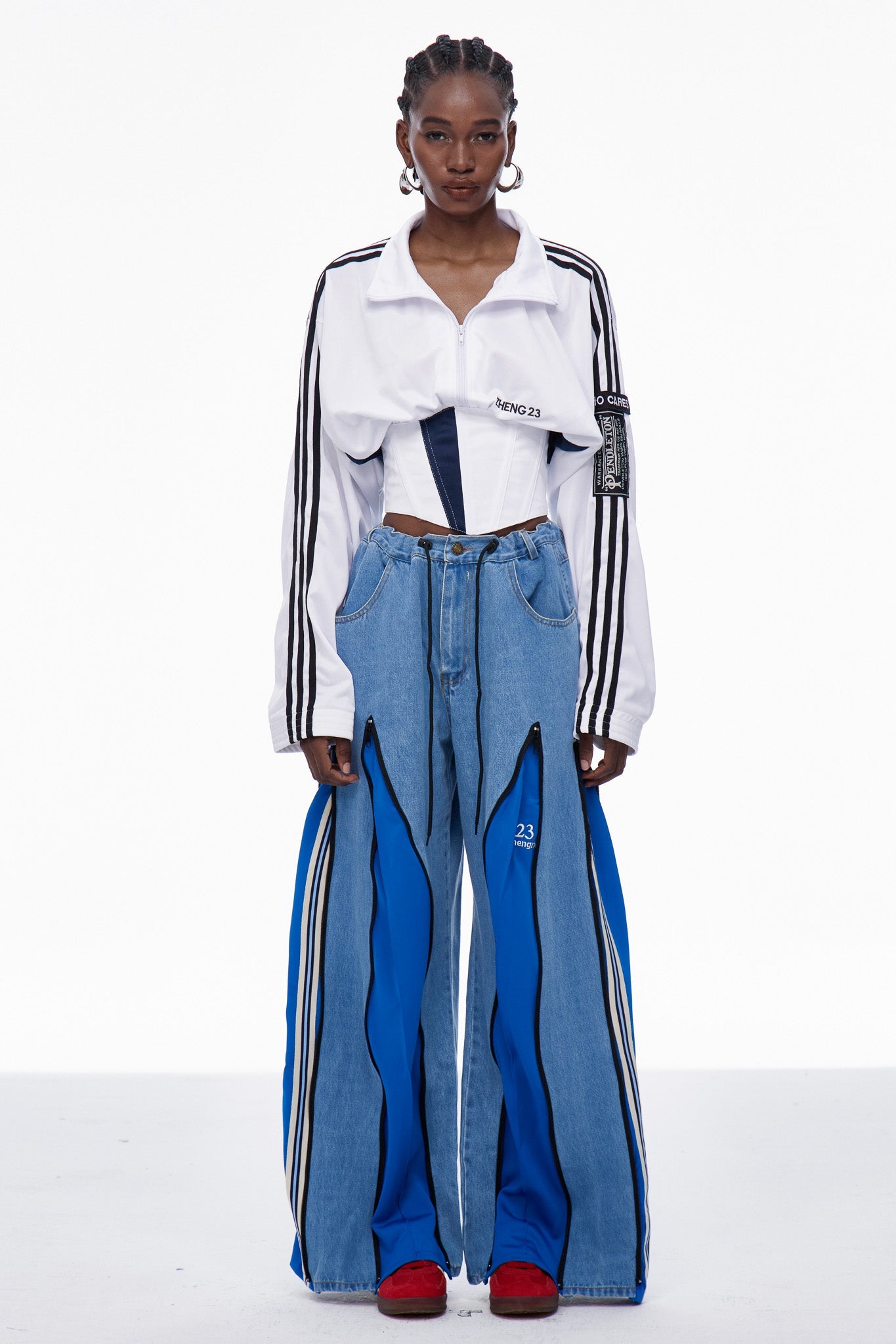 Caprina Deconstruct Zipper Stripe Jeans In Blue