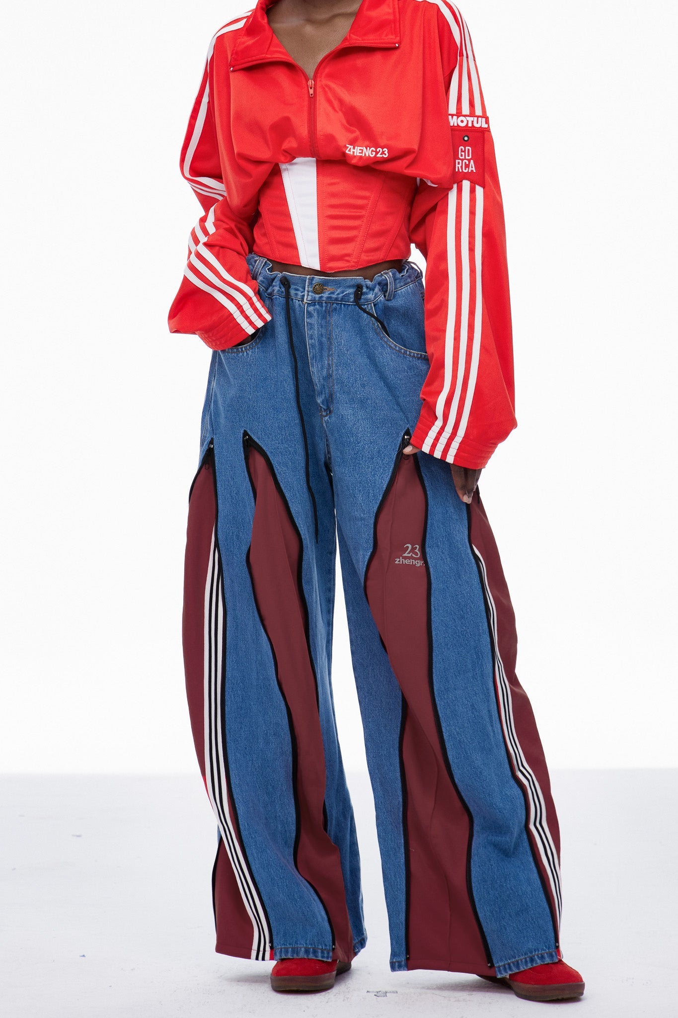 Caprina Deconstruct Zipper Stripe Jeans In Deep Red