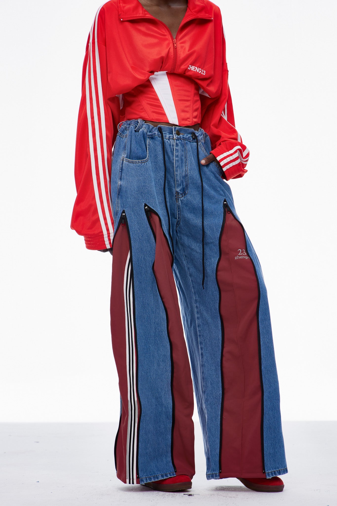 Caprina Deconstruct Zipper Stripe Jeans In Deep Red