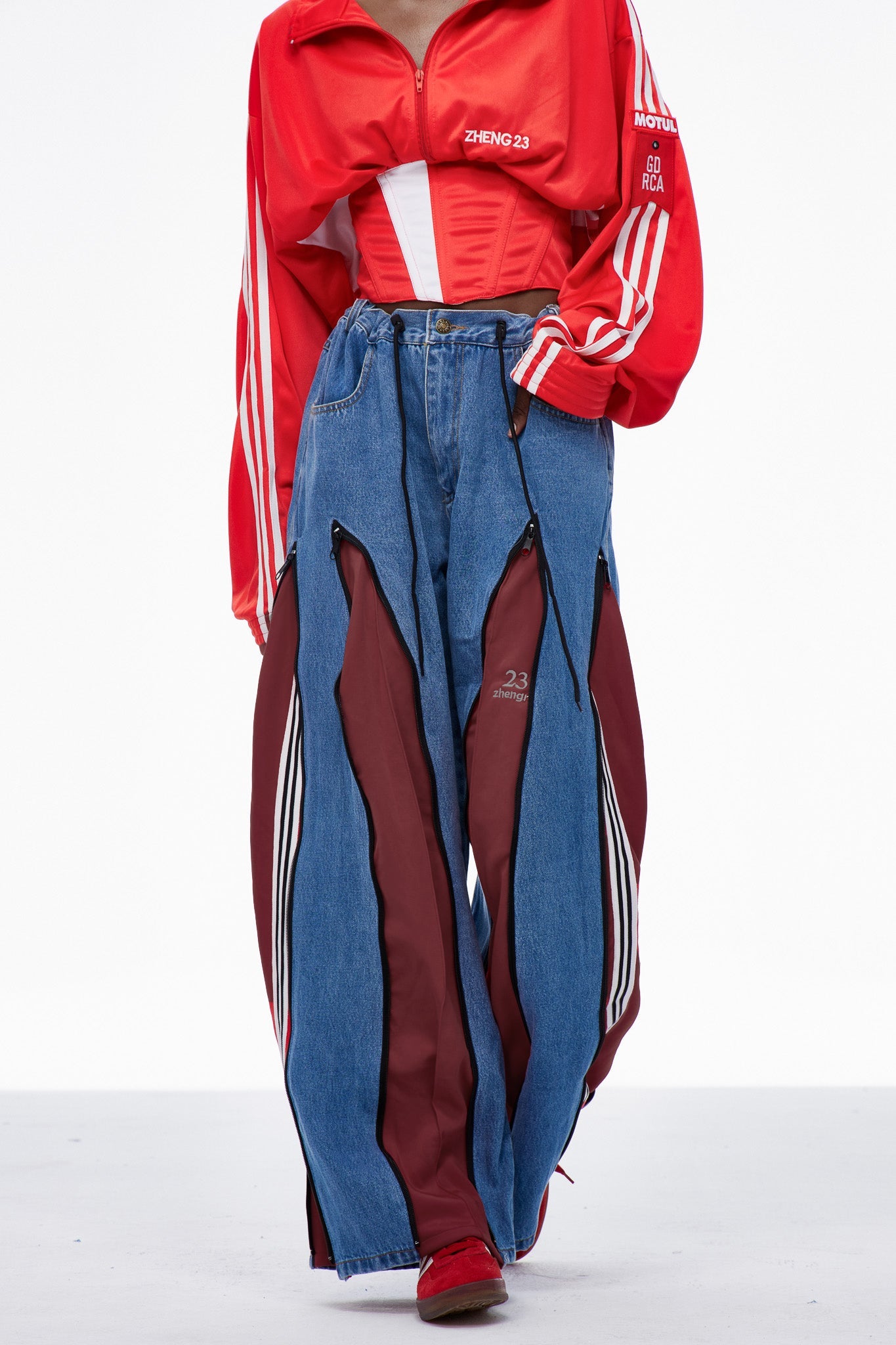 Caprina Deconstruct Zipper Stripe Jeans In Deep Red